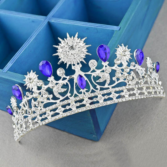 Royal Crown Headwear and Accessories featuring a sparkling silver-tone tiara with purple gemstones and crystal rhinestones.